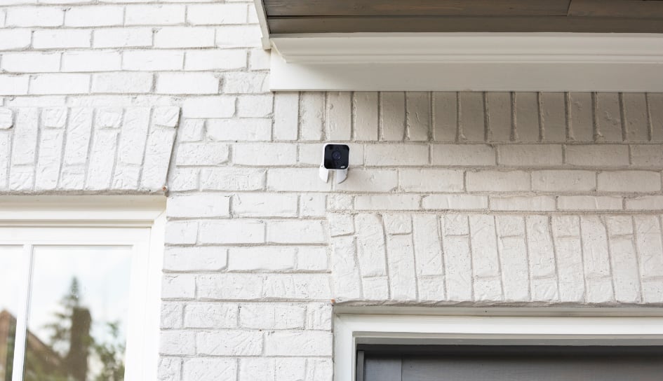 ADT outdoor camera on a Lincoln home
